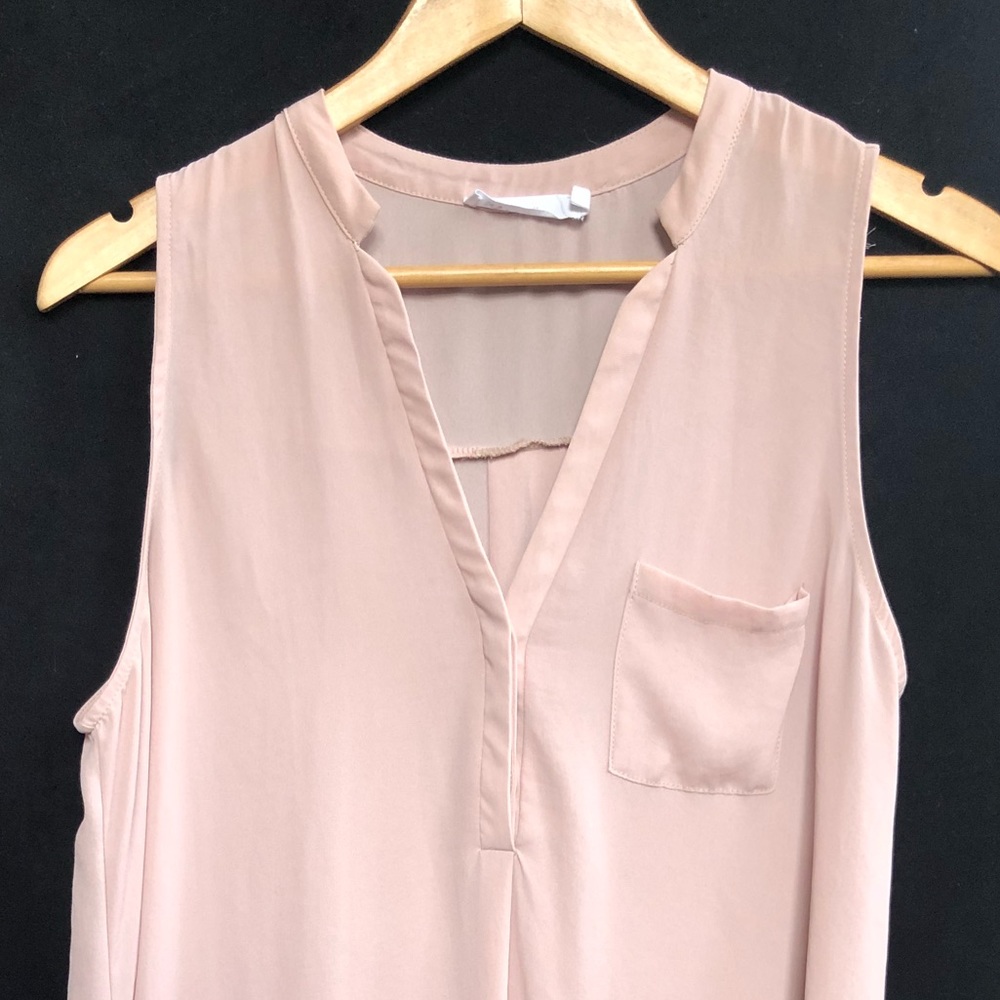 Blush sleeveless blouse